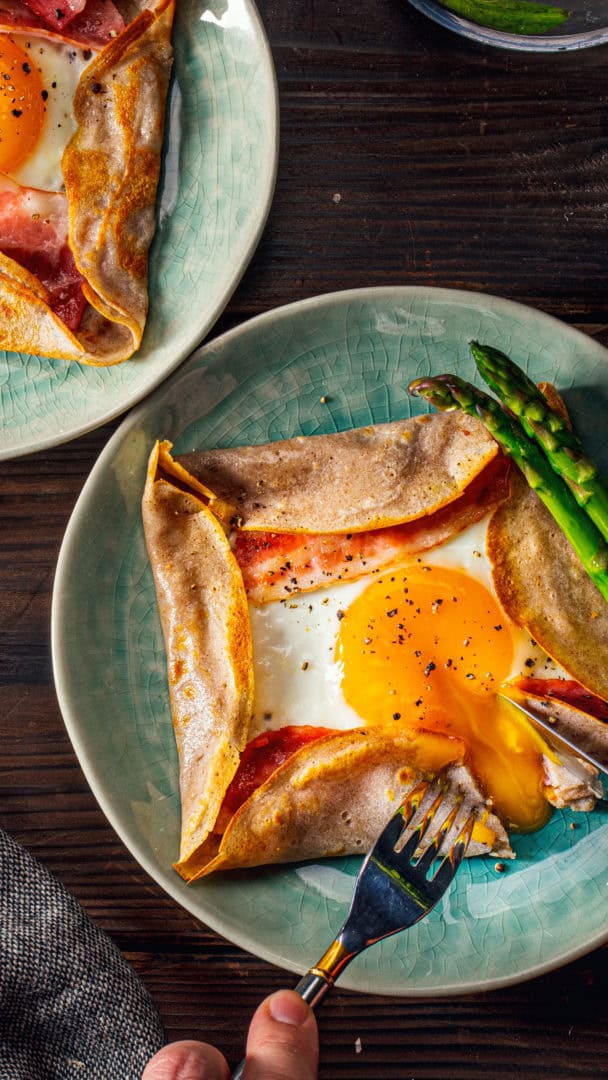 galette,french food buckwheat pancake,with egg in plate. healthy food concept image.